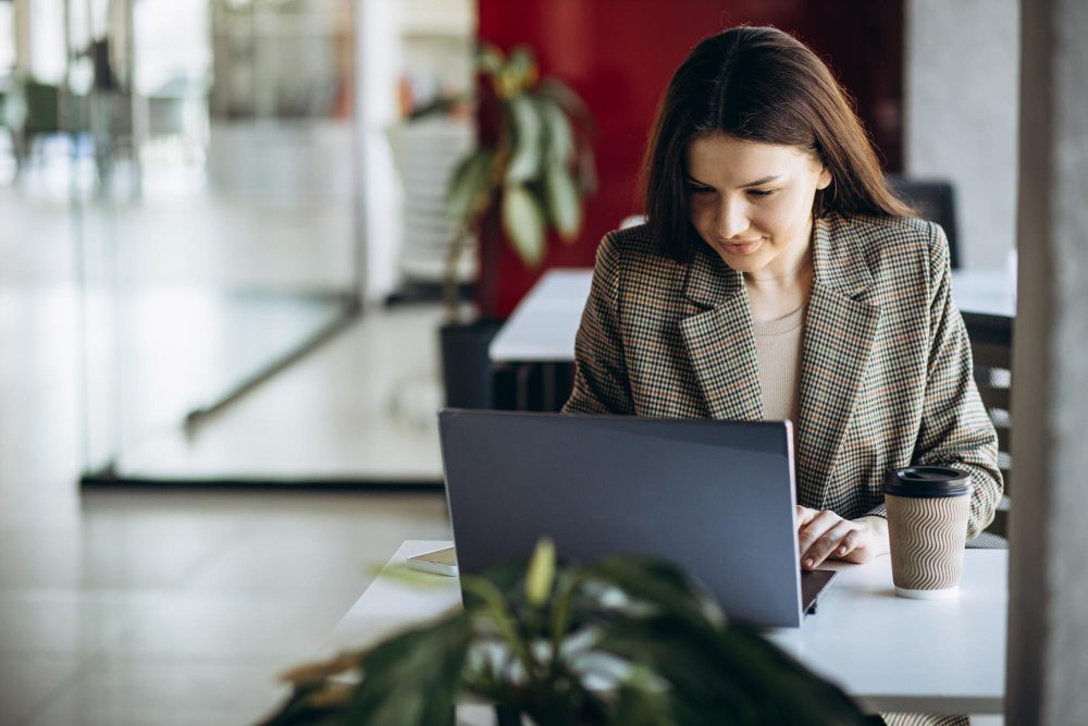 woman at office setting up zoom meeting recording