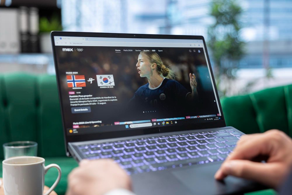 person browsing live sports to record