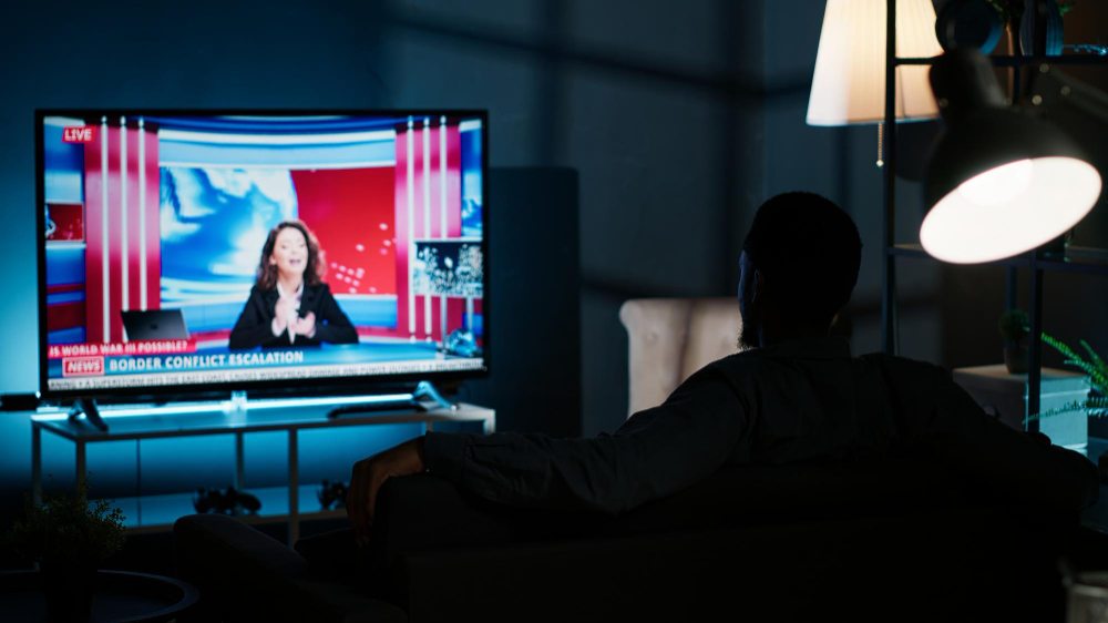 watching live news at night