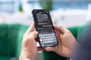tech worker using chatgpt on iphone