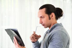 Person looking at ai generated art on tablet