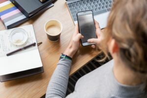 iphone user turning on dictation for voice to text