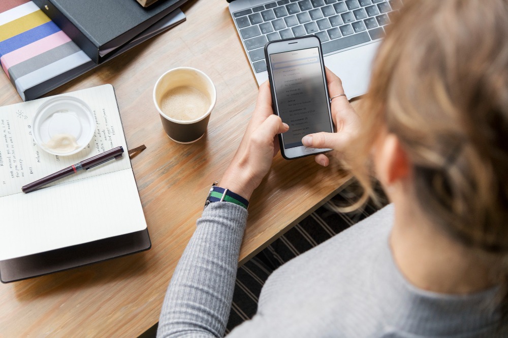 iphone user turning on dictation for voice to text