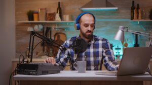 podcaster editing podcast transcript from audio to text