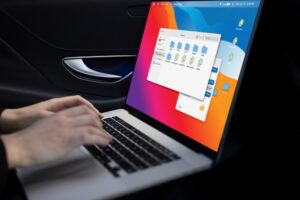 person stopping text to speech on laptop computer