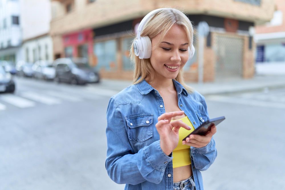 girl listening to a voice memo she recorded